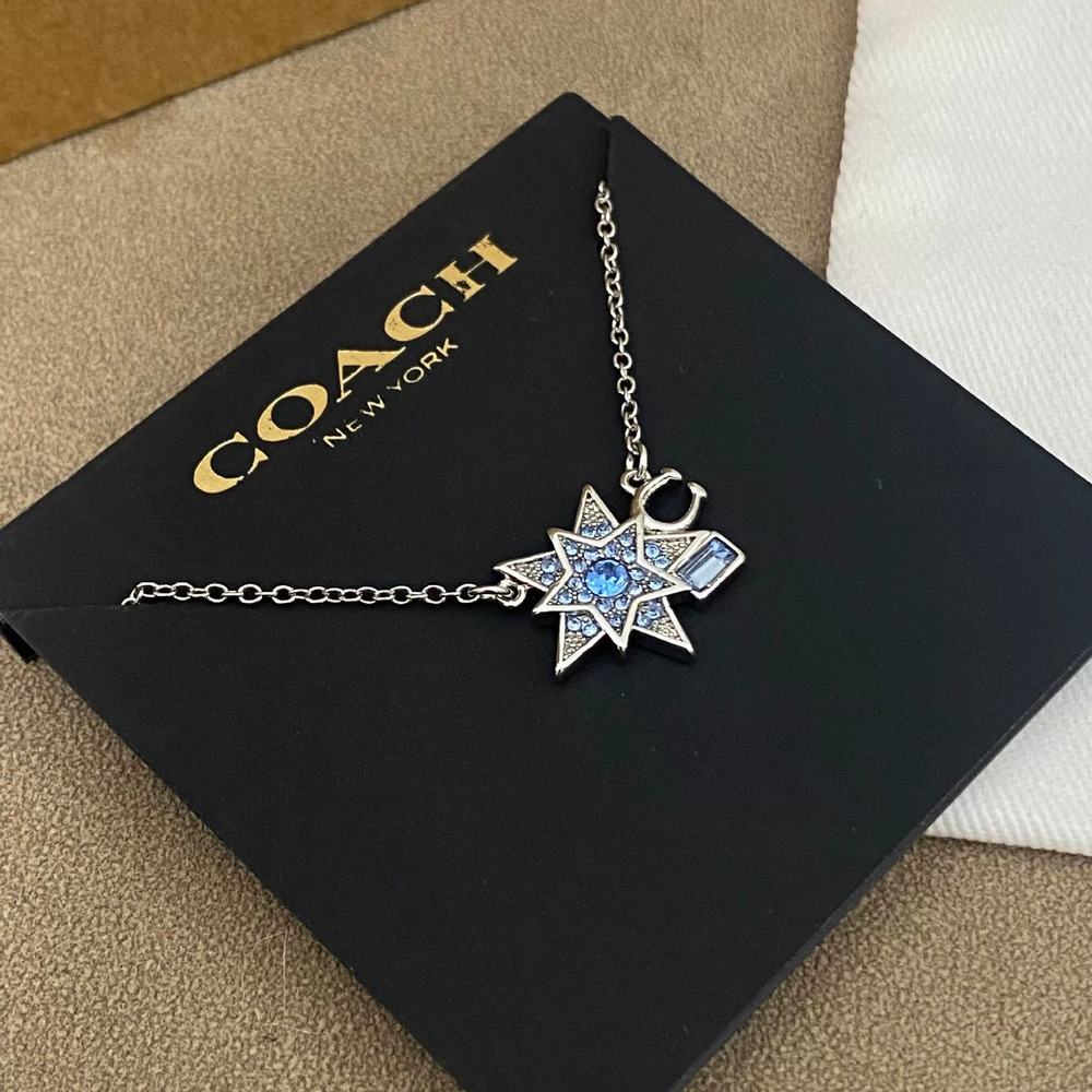 Coach Eight Point Star Necklace